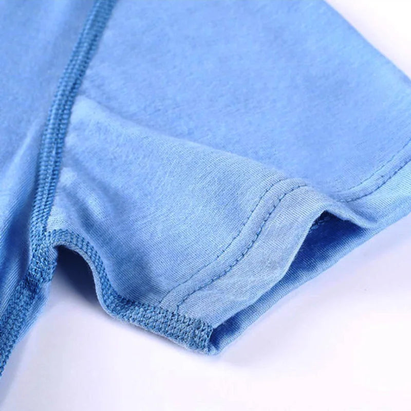 Close-up of a Kids Premium Merino Wool T-Shirt Light Blue Temperature Regulating Shirt.