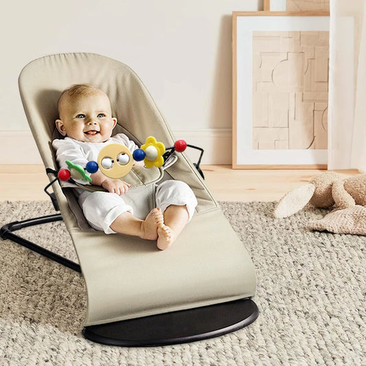 Stylish Beige babysitter with included activity toy for babies.