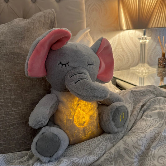 Soft elephant plush toy with soothing light and music – perfect baby sleep companion.